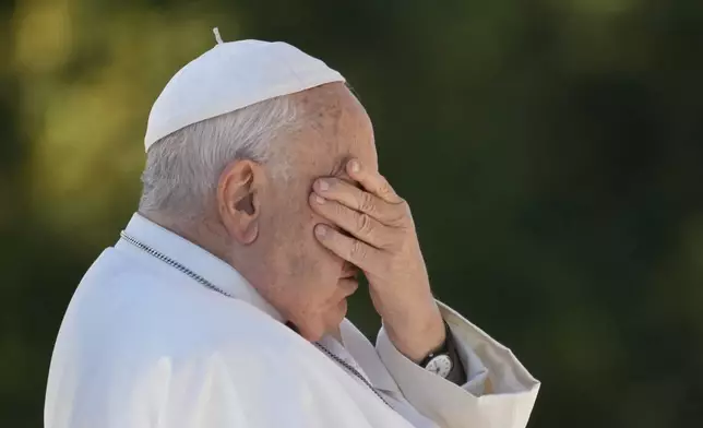 Pope Francis arrives at a meeting with bishops, deacons, and religious people in Koekelberg Basilica of the Sacred Heart, Belgium, Saturday, Sept. 28, 2024. (AP Photo/Andrew Medichini)