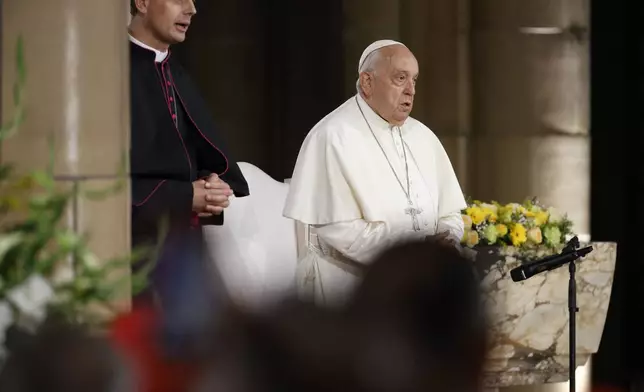 Pope Francis delivers his message during a meeting with bishops, deacons, and religious people in Koekelberg Basilica of the Sacred Heart, in Koekelberg, Belgium, Saturday Sept. 28, 2024. (AP Photo/Omar Havana)