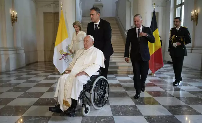 Pope Francis meets with King Philippe and Queen Mathilde in the Castle of Laeken, Brussels, Friday, Sept. 27, 2024. (AP Photo/Andrew Medichini)