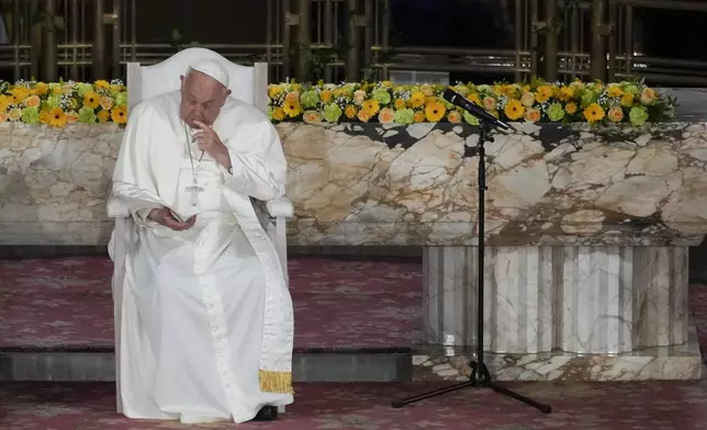 Pope Francis attends a meeting with bishops, deacons, and religious people in Koekelberg Basilica of the Sacred Heart, in Brussels, Saturday, Sept. 28, 2024. (AP Photo/Andrew Medichini)