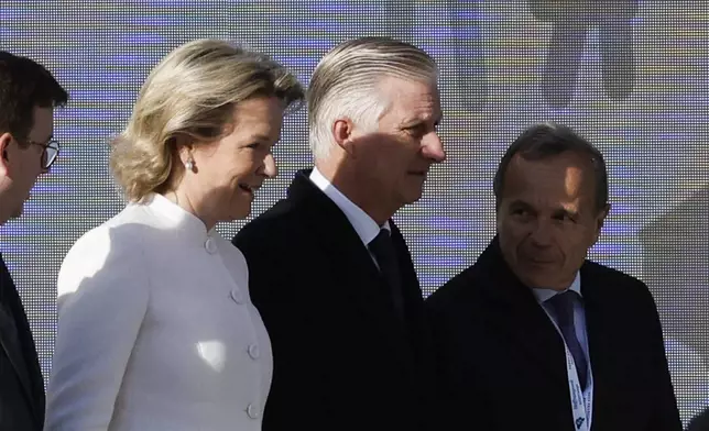 Queen Mathilde and King Philippe arrives to attend the holy mass by Pope Francis at the King Baudouin stadium in Brussels, Belgium, Sunday, Sept. 29, 2024. (AP Photo/Omar Havana)