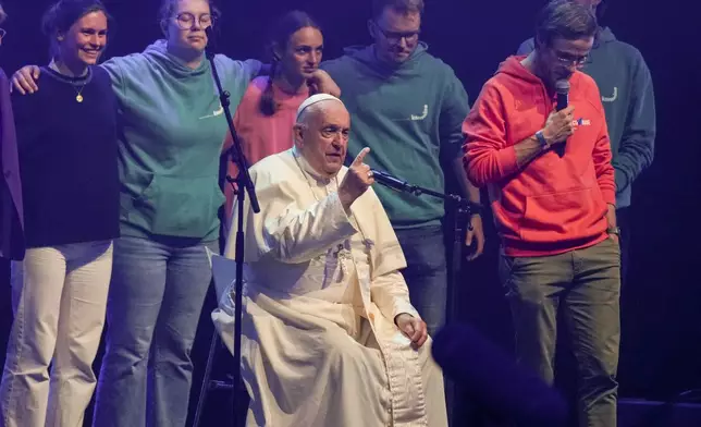 Pope Francis attends the Hope Happening youth festival at the Brussels Expo, Belgium, Saturday, Sept. 28, 2024, on the third day of his four-day visit to Luxembourg and Belgium. (AP Photo/Andrew Medichini)