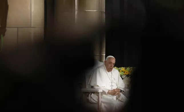 Pope Francis delivers his message during a meeting with bishops, deacons, and religious people in Koekelberg Basilica of the Sacred Heart, in Koekelberg, Belgium, Saturday Sept. 28, 2024. (AP Photo/Omar Havana)