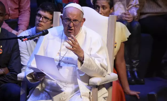 Pope Francis delivers his message as he meets with students of the Louvain Catholic University in Ottignies-Louvain-la-Neuve, Belgium, Saturday, Sept. 28, 2024. (AP Photo/Andrew Medichini)