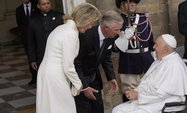 Pope Francis meets with King Philippe and Queen Mathilde in the Castle of Laeken, Brussels, Friday, Sept. 27, 2024. (AP Photo/Andrew Medichini)