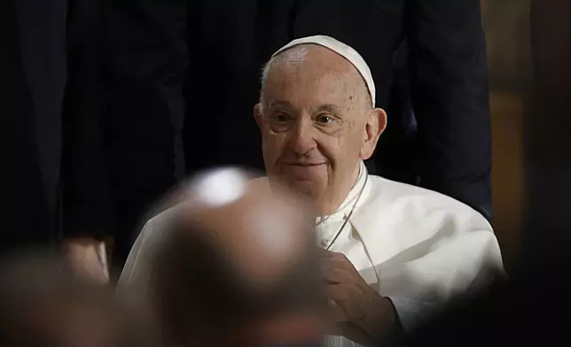 Pope Francis arrives for a meeting with bishops, deacons, and religious people in Koekelberg Basilica of the Sacred Heart, in Koekelberg, Belgium, Saturday Sept. 28, 2024. (AP Photo/Omar Havana)