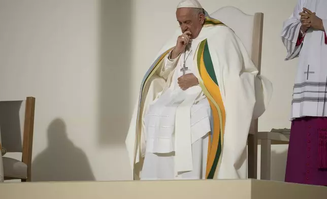 Pope Francis presides over the Sunday mass at King Baudouin Stadium, in Brussels Sunday, Sept. 29, 2024. (AP Photo/Andrew Medichini)