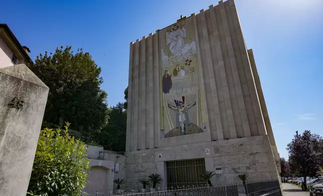 FILE - A mosaic by ex-Jesuit artist Marko Rupnik is seen on the main facade of the Church of Our Lady of the Canadian Martyrs, June 28, 2024, in Rome. (AP Photo/Andrew Medichini, File)