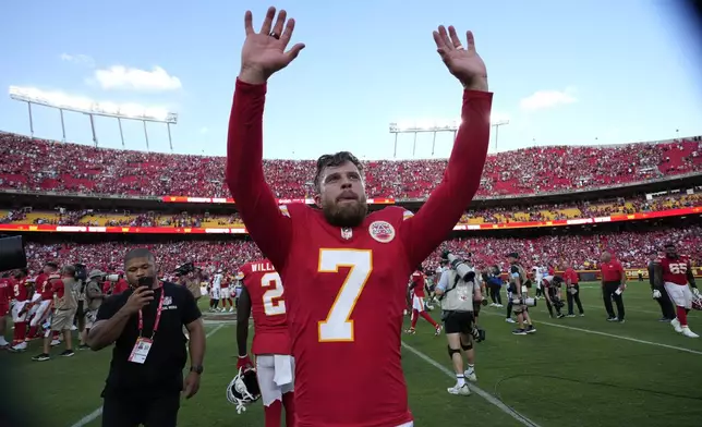Kansas City Chiefs kicker Harrison Butker (7) walks off the field after kicking a 51-yard field goal at the end of an NFL football game against the Cincinnati Bengals to give the Chiefs a 26-25 victory Sunday, Sept. 15, 2024, in Kansas City, Mo. (AP Photo/Charlie Riedel)