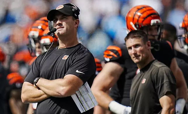 Cincinnati Bengals head coach Zac Taylor watches during the first half of an NFL football game against the Carolina Panthers, Sunday, Sept. 29, 2024, in Charlotte, N.C. (AP Photo/Rusty Jones)