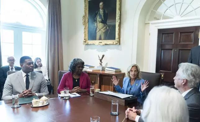 First lady Jill Biden, third from left, speaks during a cabinet meeting presided over by President Joe Biden, in the Cabinet Room of the White House, Friday, Sept. 20, 2024. (AP Photo/Manuel Balce Ceneta)