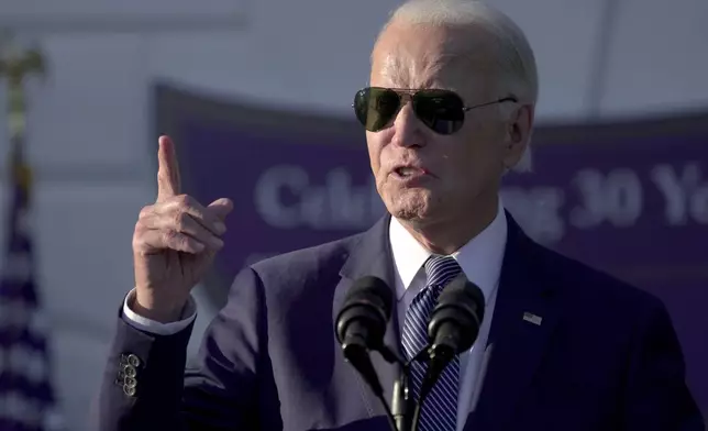 President Joe Biden speaks during the Violence Against Women Act 30th anniversary celebration on the South Lawn of the White House, Thursday, Sept. 12, 2024, in Washington. (AP Photo/Manuel Balce Ceneta)