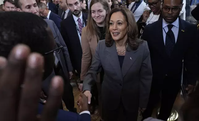 Vice President Kamala Harris greets guests in the East Room of the White House in Washington, Thursday, Sept. 26, 2024, following an even on gun violence in the United States. (AP Photo/Susan Walsh)