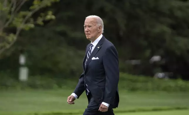 President Joe Biden walks out of the White House to board Marine One on the South Lawn in Washington, Monday, Sept. 23, 2024, for a short trip to Joint Base Andrews, Md., and then on to New York. (AP Photo/Mark Schiefelbein)