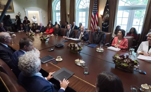 President Joe Biden, back row, center, speaks during a meeting with the members of his cabinet and first lady Jill Biden, in the Cabinet Room of the White House, Friday, Sept. 20, 2024. (AP Photo/Manuel Balce Ceneta)