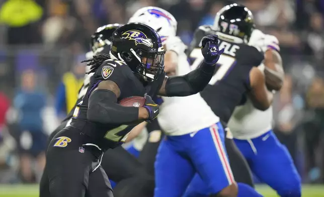 Baltimore Ravens running back Derrick Henry runs for a long touchdown against the Buffalo Bills during the first half of an NFL football game, Sunday, Sept. 29, 2024, in Baltimore. (AP Photo/Stephanie Scarbrough)