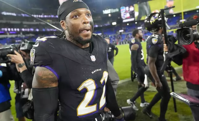 Baltimore Ravens running back Derrick Henry walk on the field following an NFL football game against the Buffalo Bills, Sunday, Sept. 29, 2024, in Baltimore. The Ravens won 35-10. (AP Photo/Stephanie Scarbrough)