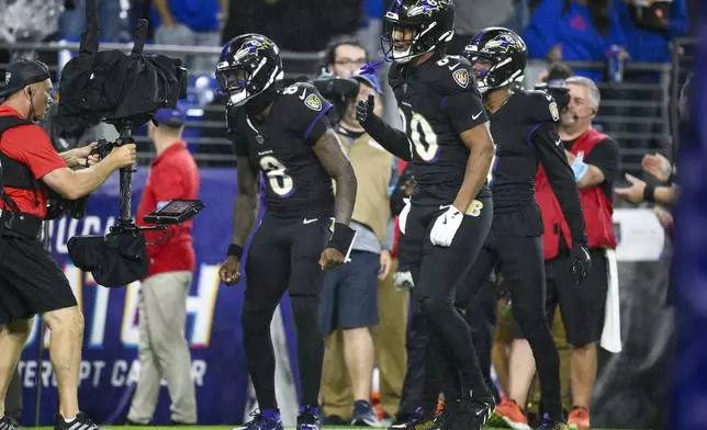 Baltimore Ravens quarterback Lamar Jackson (8) reacts onto a camera operator after scoring on a run against the Buffalo Bills during the second half of an NFL football game, Sunday, Sept. 29, 2024, in Baltimore. (AP Photo/Nick Wass)