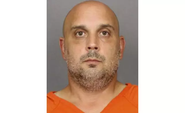 This image released by the Salem County, N.J., Correctional Facility shows Sean M. Higgins, charged with two counts of death by auto, along with reckless driving, possession of an open container and consuming alcohol in a motor vehicle, in the killings of NHL hockey player Johnny Gaudreau and his brother Matthew as they bicycled on a rural road in New Jersey on Aug. 29, 2024. (Salem County Correctional Facility via AP)