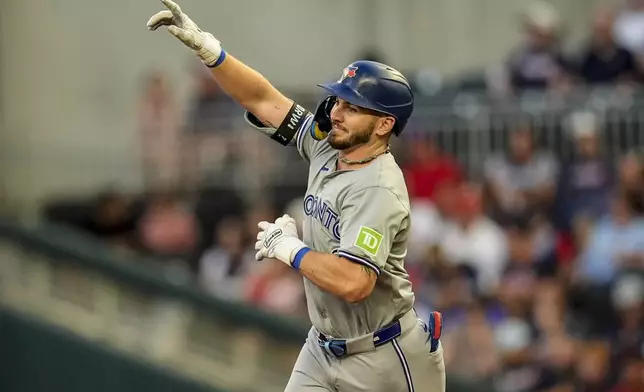 Toronto Blue Jays' Spencer Horwitz (48) celebrates his solo homer against the Atlanta Braves in the first inning of a baseball game, Saturday, Sept. 7, 2024, in Atlanta.(AP Photo/Mike Stewart)