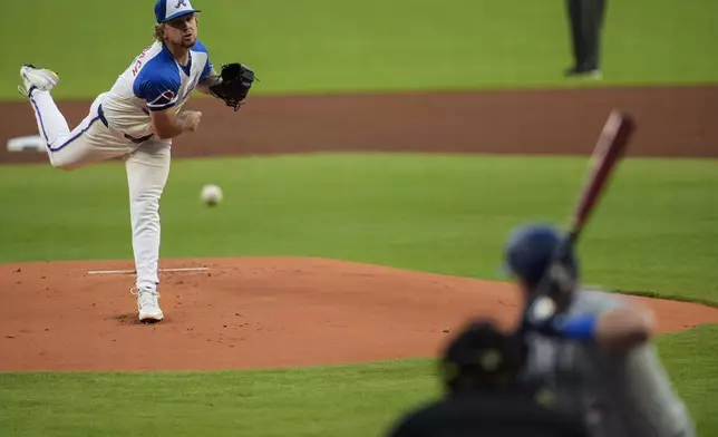 Atlanta Braves pitcher Spencer Schwellenbach (56) delivers to Toronto Blue Jays' Daulton Varsho (25) in the first innjing of a baseball game, Saturday, Sept. 7, 2024, in Atlanta.(AP Photo/Mike Stewart)