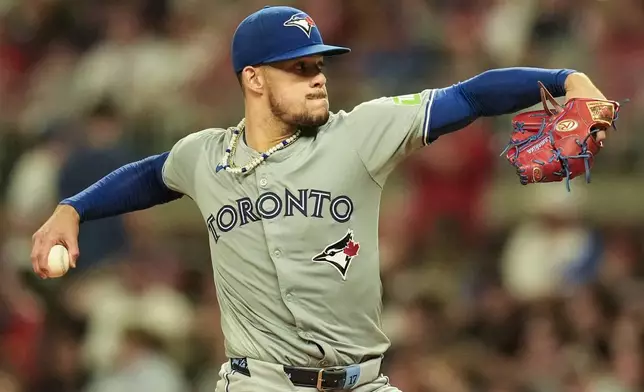 Toronto Blue Jays pitcher José Berríos (17) works against the Atlanta Braves in the fourth inning of a baseball game, Saturday, Sept. 7, 2024, in Atlanta.(AP Photo/Mike Stewart)