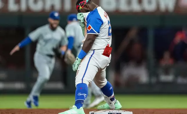 Atlanta Braves outfielder Michael Harris II (23) reacts to being tagged out at second base in the fifth inning of a baseball game against the Toronto Blue Jays, Saturday, Sept. 7, 2024, in Atlanta.(AP Photo/Mike Stewart)