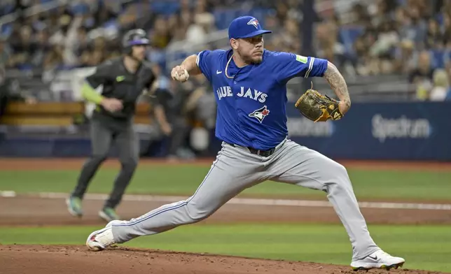 Toronto Blue Jays starter Yariel Rodríguez pitches against the Tampa Bay Rays during the first inning of a baseball game Saturday, Sept. 21, 2024, in St. Petersburg, Fla. (AP Photo/Steve Nesius)