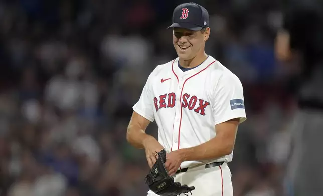 Boston Red Sox pitcher Rich Hill steps off the mound after pitching in the eighth inning of a baseball game against the Toronto Blue Jays, Thursday, Aug. 29, 2024, in Boston. (AP Photo/Steven Senne)