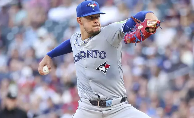 Toronto Blue Jays starting pitcher José Berríos delivers against the Minnesota Twins during the first inning of a baseball game, Saturday, Aug. 31, 2024, in Minneapolis. (AP Photo/Matt Krohn)