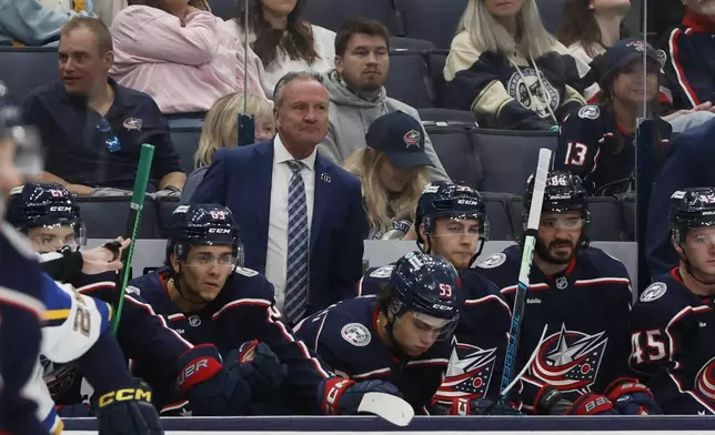 Columbus Blue Jackets head coach Dean Evason watches his team play against the St. Louis Blues during the third period of a preseason NHL preseason hockey game Wednesday, Sept. 25, 2024, in Columbus, Ohio. (AP Photo/Jay LaPrete