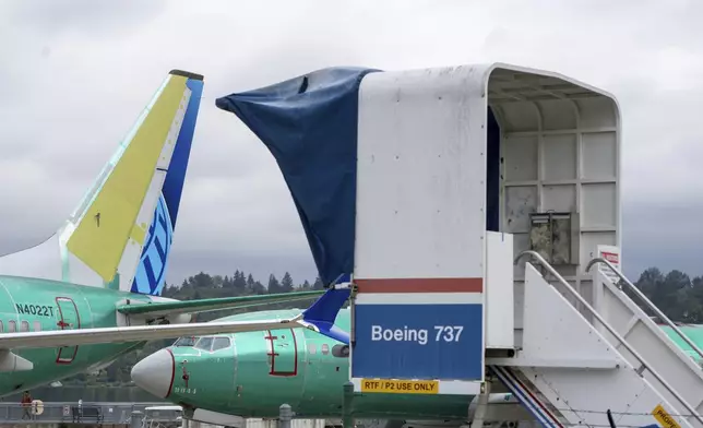 Boeing 737 MAX airliners are pictured at the company's factory on Thursday, Sept. 12, 2024, in Renton, Wash. (AP Photo/Stephen Brashear)