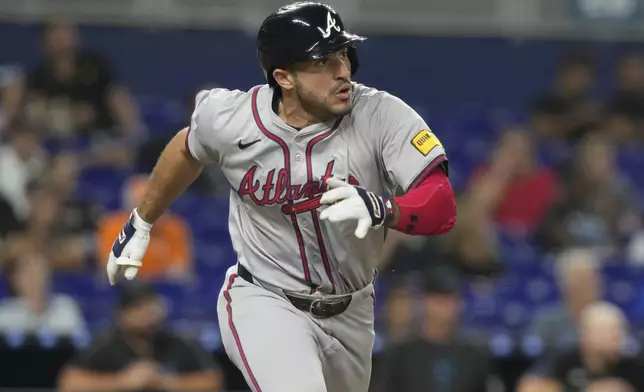 Atlanta Braves' Ramón Laureano runs after hitting a home run during the sixth inning of a baseball game against the Miami Marlins, Friday, Sept. 20, 2024, in Miami. (AP Photo/Marta Lavandier)