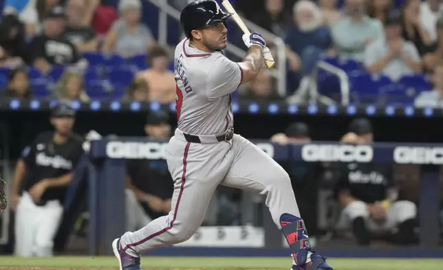 Atlanta Braves' Ramón Laureano (18) hits a home run during the sixth inning of a baseball game against the Miami Marlins, Friday, Sept. 20, 2024, in Miami. (AP Photo/Marta Lavandier)