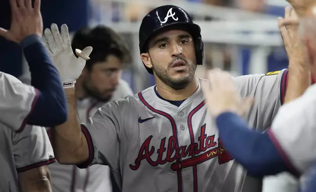 Atlanta Braves' Ramón Laureano celebrates a home run during the sixth inning of a baseball game against the Miami Marlins, Friday, Sept. 20, 2024, in Miami. (AP Photo/Marta Lavandier)