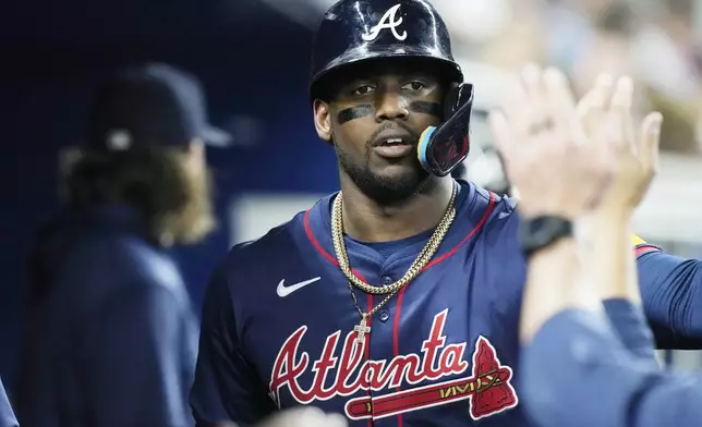 Atlanta Braves' Jorge Soler celebrates after hitting a home run during the second inning of a baseball game against the Miami Marlins, Saturday, Sept. 21, 2024, in Miami. (AP Photo/Marta Lavandier)