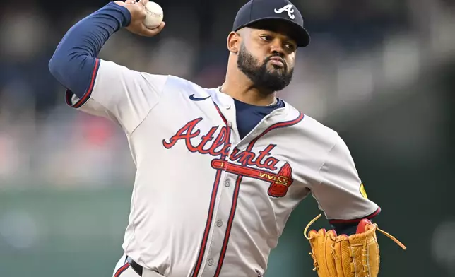 Atlanta Braves starting pitcher Reynaldo Lopez throws during the first inning of a baseball game against the Washington Nationals, Tuesday, Sept. 10, 2024, in Washington. (AP Photo/John McDonnell)