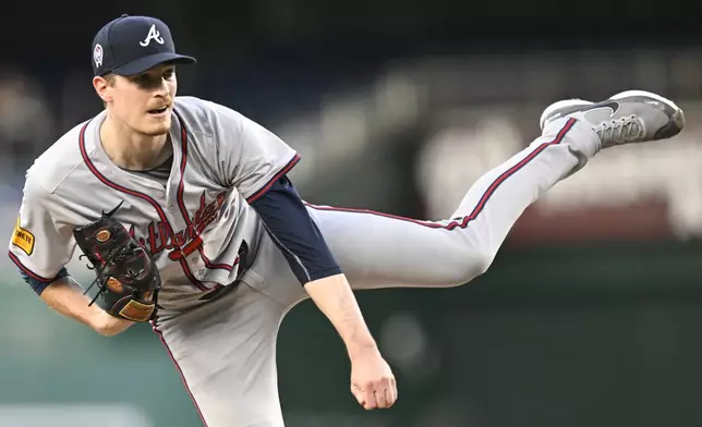 Atlanta Braves starting pitcher Max Fried follows through during the first inning of a baseball game against the Washington Nationals, Wednesday, Sept. 11, 2024, in Washington. (AP Photo/John McDonnell)