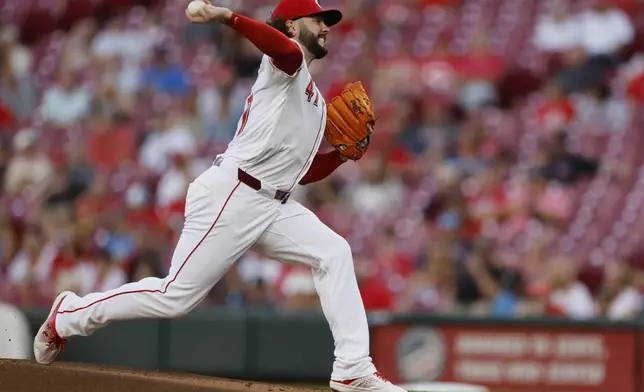 Cincinnati Reds starting pitcher Jakob Junis throws against the Atlanta Braves during the first inning of a baseball game, Wednesday, Sept. 18, 2024, in Cincinnati. (AP Photo/Jay LaPrete)