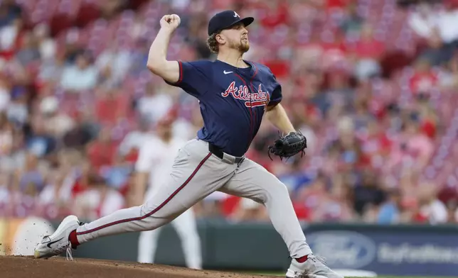 Atlanta Braves starting pitcher Spencer Schwellenbach throws against the Cincinnati Reds during the first inning of a baseball game, Wednesday, Sept. 18, 2024, in Cincinnati. (AP Photo/Jay LaPrete)