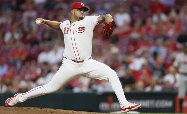 Cincinnati Reds relief pitcher Fernando Cruz throws against the Atlanta Braves during the second inning of a baseball game, Tuesday, Sept. 17, 2024, in Cincinnati. (AP Photo/Jay LaPrete)