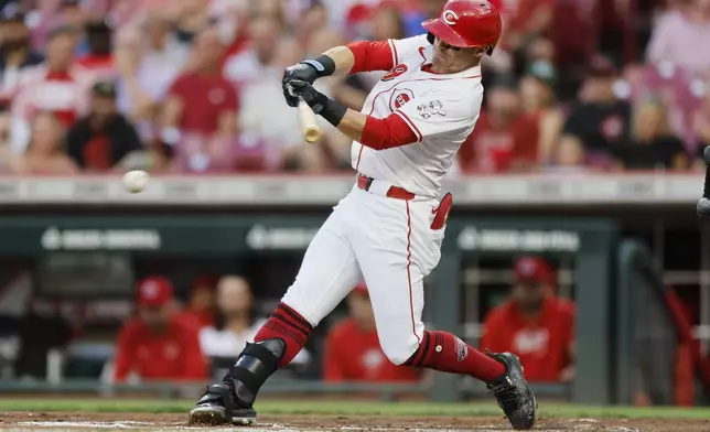 Cincinnati Reds' TJ Friedl grounds out against the Atlanta Braves during the second inning of a baseball game, Wednesday, Sept. 18, 2024, in Cincinnati. (AP Photo/Jay LaPrete)