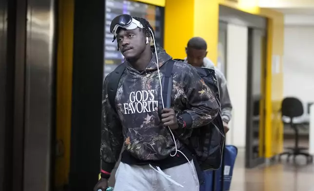 The Philadelphia Eagles' A.J. Brown arrives at Sao Paulo International airport ahead of a game against the Philadelphia Eagles, in Guarulhos, great Sao Paulo area, Wednesday, Sept. 4, 2024. (AP Photo/Andre Penner)