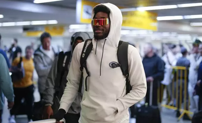 The Green Bay Packers' Romeo Doubs arrives at Sao Paulo International airport ahead of a game against the Philadelphia Eagles in Guarulhos, greater Sao Paulo, Brazil, Wednesday, Sept. 4, 2024. (AP Photo/Andre Penner)