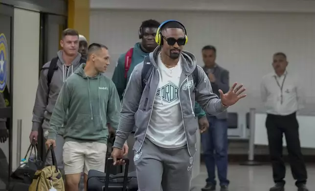 Philadelphia Eagles quarterback Jalen Hurts arrives at Sao Paulo International airport ahead of a game against the Philadelphia Eagles, in Guarulhos, greater Sao Paulo, Wednesday, Sept. 4, 2024. (AP Photo/Andre Penner)