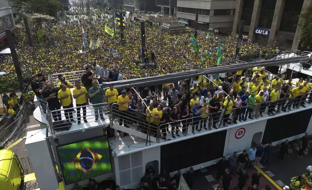 Demonstrators take part in a protest calling for the impeachment of Supreme Court Minister Alexandre de Moraes, who recently imposed a nationwide block on Elon Musk's social media platform X, in Sao Paulo, Saturday, Sept. 7, 2024. (AP Photo/Ettore Chiereguini)