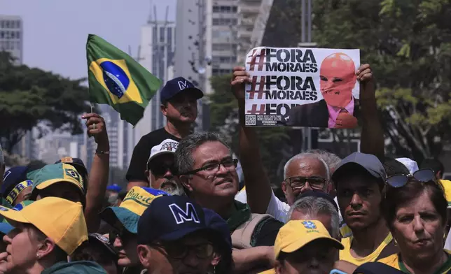 Demonstrators take part in a protest calling for the impeachment of Supreme Court Minister Alexandre de Moraes, who recently imposed a nationwide block on Elon Musk’s social media platform X, in Sao Paulo, Saturday, Sept. 7, 2024. (AP Photo/Ettore Chiereguini)