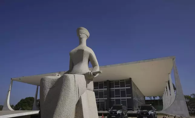 Lady Justice stands outside the Supreme Court in Brasilia, Brazil, Monday, Sept. 2, 2024. (AP Photo/Eraldo Peres)