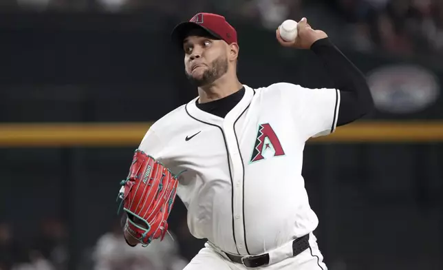 Arizona Diamondbacks pitcher Eduardo Rodriguez throws against the Milwaukee Brewers in the first inning during a baseball game, Friday, Sept. 13, 2024, in Phoenix. (AP Photo/Rick Scuteri)