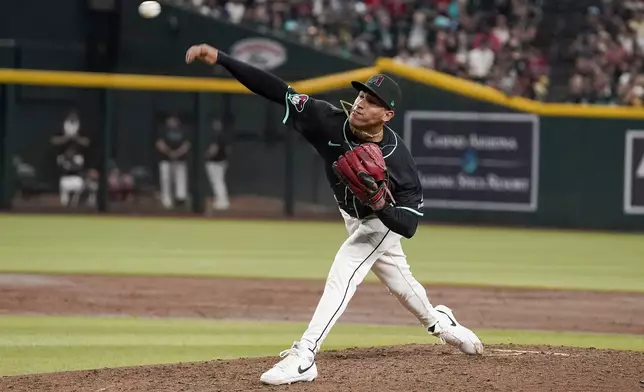 Arizona Diamondbacks pitcher Yilber Diaz throws against the Milwaukee Brewers during the sixth inning of a baseball game, Saturday, Sept. 14, 2024, in Phoenix. (AP Photo/Darryl Webb)